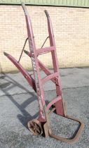 C20th L.N.E.R. heavy duty large luggage porters trolley with cast wheels, painted in red, stamped