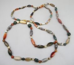 Polished stone beaded necklace made up of mixed stones including bloodstone, agate, quartz etc.