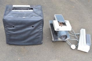 Vintage Bell & Howell Filmosound 16mm projector and a Rollei slide projector