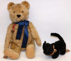 Vintage straw filled squeaky cat soft toy in black mohair, H14cm, and a blonde mohair teddy bear