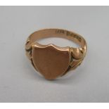 9ct rose gold signet ring with shield face, stamped 375, size R1/2, 5.17g