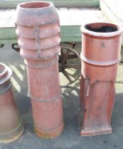 Large vented terracotta chimney pot. 124cm. Salt glazed chimney pot 106cm.(2)