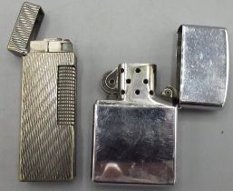 Dunhill silver plated butane cigarette lighter US.RE 24163 Patented, H6.3cm and a Zippo chrome