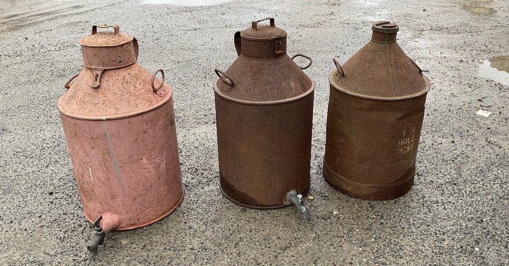 North eastern railways paraffin dispenser and two similar paraffin dispensers (3) Max height 69cm