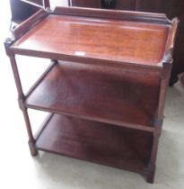 C20th mahogany three tier buffet, galleried top on turned supports, W70cm D42cm H74cm