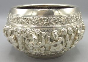 C20th white metal Indian bowl in the Burmese style, compressed tapering circular form with intricate