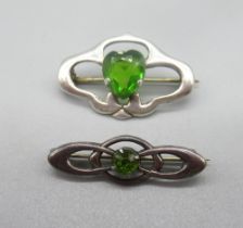 Two Charles Horner brooches set with green stones, both stamped CH, both approx. L3cm