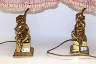Pair of brass cherub table lamps with shades, H58cm (2)