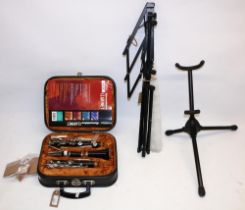 Besson '35 clarinet in fitted case, a music stand and a musical instrument stand (3)