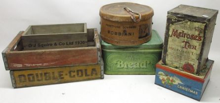 Three wooden crates, two flour containers, and a collection of vintage food tins and boxes (qty.)