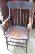 Early C20th American elbow chair, with shaped cresting rail and bentwood arms on turned supports