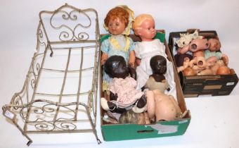 Collection of mid C20th plastic and composition dolls and doll parts, doll clothing, and a doll