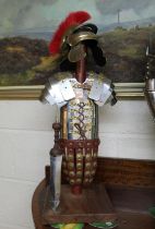 Detailed model of a Roman Centurion with Gladius on stand. 54cm. A Greek soldier with shield and