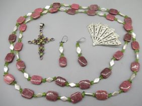 Azendi pink necklace set with pink polished stones, peridot and mother of pearl, a silver cross