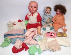 Two bisque head dolls marked Heubach Koppelsdorf: 342 4/0 and 320 2/0; one other doll; and a