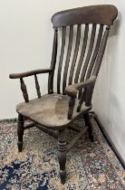 Victorian ash and elm slat back kitchen Windsor type arm chair, on turned supports with stretcher,