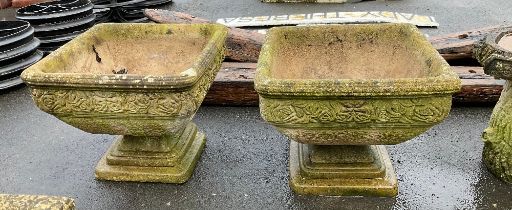 A pair of large garden planters on plinths with rose and floral design 43 x 53cm