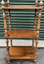 Victorian walnut three-tier what-not with galleried top on mushroom turned feet, W55cm D35cm