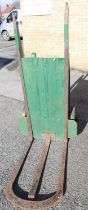 C20th N.E.R. painted green 2 wheeled heavy duty luggage trolley, with cast metal plaque 'NER2821',