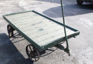 C20th N.E.R. 4 wheeled train cart, with sprung rear axle, double handled pulley, cast plaque '