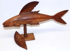 Pitcairn Island flying fish, of carved hardwood with inlaid eyes and inscribed to wings ''Souvenir