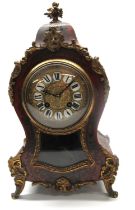 C20th French red Boulle mantel clock, waisted case with applied cast brass mounts, brass bezel