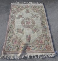 C20th Chinese embossed washed wool rug, cream ground with central medallion and stylised floral