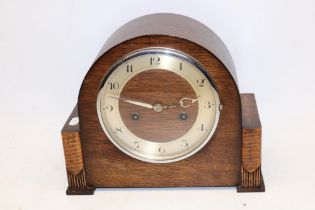 1930's H.A.C. oak striking mantel clock, chrome plated bezel enclosing silvered Arabic chapter ring,