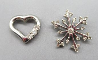 White metal snowflake set with diamonds, with indistinct mark, 2.42g and a 9ct white gold heart