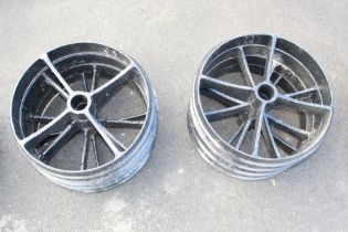 Two sets of four spoke cast iron Shepherd Hut wheels. 48cm diameter