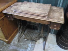 Singer sewing machine table with fold out machine and cast metal base