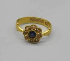 22ct yellow gold blue stone and seed pearl cluster ring, stamped 22ct, size M, 3.43g