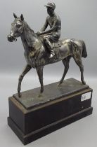 C20th EPNS equestrian figure of a horse and jockey on ebonised base, overall H31cm