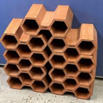 Nine clay double hexagonal drainage pipes, W32cm D24cm (9)