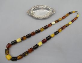 Amber beaded necklace, clasp stamp 925, L63cm, a hallmarked sterling silver pin dish, 0.6ozt