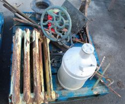 Pallet containing various cast iron items. Radiators, Irons, urn, tools, coat hooks, candle holders,