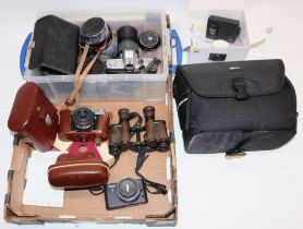 Collection of cameras and lenses, incl. a Zeiss Ikon Contaflex, Nikon 1 J2, and a Minolta SRT-202 (