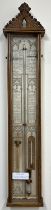 Late C19th oak Admiral Fitzroy's Barometer, carved gothic case enclosing paper register no.