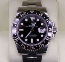 Rolex Oyster Perpetual Date GMT-Master II stainless steel wristwatch, signed black dial with baton