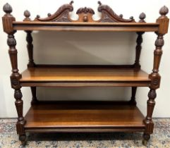 Victorian walnut buffet, with swan neck cresting, the three rectangular tiers on acanthus carved