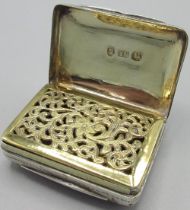 George 1V silver rectangular vinaigrette, engraved with foliage, lid with vacant cartouche, gilt