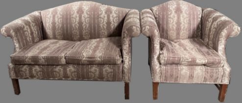 Chippendale style sofa with serpentine back and out scroll arms upholstered in patterned damask, and