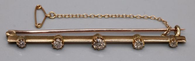 18ct yellow gold and diamond Victorian bar brooch, set with five graduating round cut diamonds, with