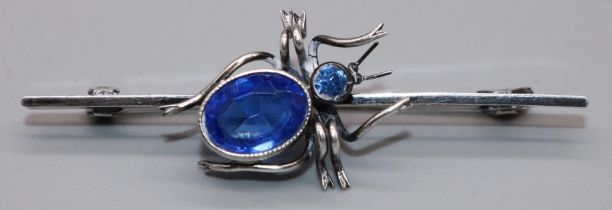 Early 20th century silver spider bar brooch, Charles Horner, set with blue stone head and body,