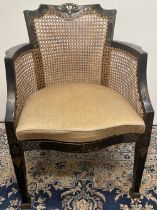 Adam Revival bergere arm chair, Chinoiserie decorated with pagodas and trelliswork on a black