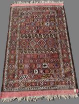 20th century Persian wool rug, geometric multi-coloured field within repeating border, W115cm W186cm