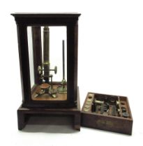 19th century Amadio brass monocular microscope with coarse and fine rack and pinion adjust and two