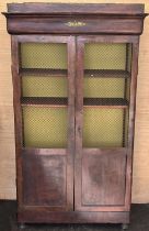 19th century continental mahogany bookcase with two metal grilled and panel doors and four