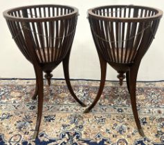 Pair of Regency Revival openwork urn shaped tripod jardiniere, with turned finials on slender square