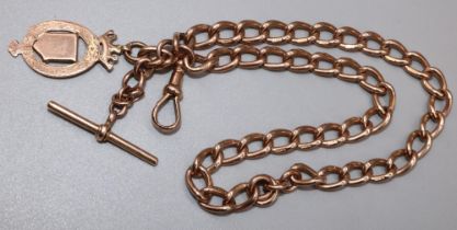 9ct rose gold curb link Albert with T bar and attached shield fob, stamped 375, 47.2g